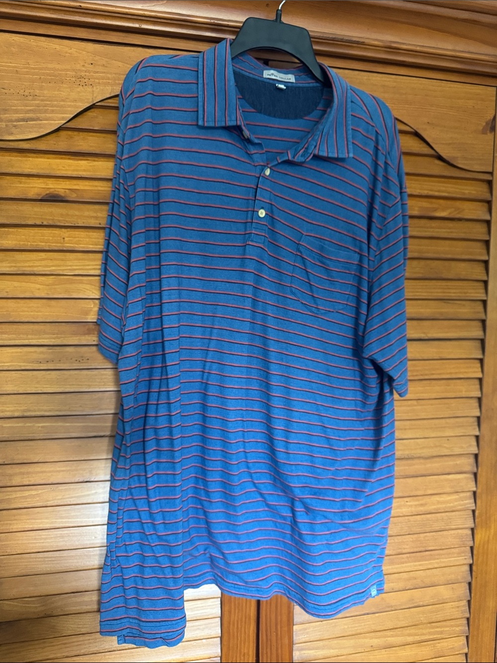 Peter Millar Men's Blue Polo Shirt with Red and Navy Stripes